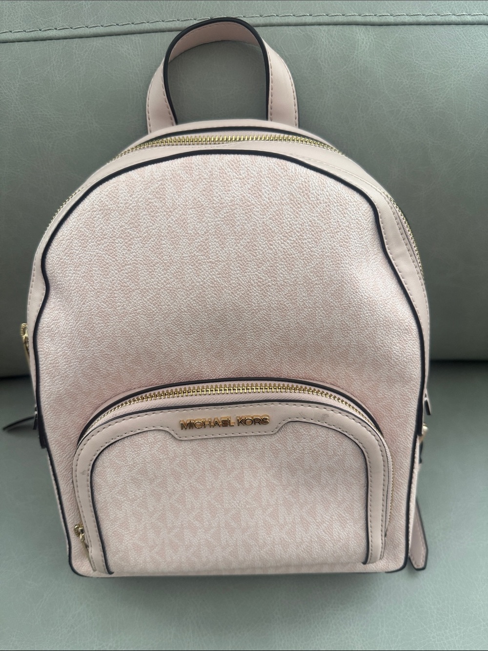 Michael Kors Pale Pink Signature Mini Backpack with Gold Hardware